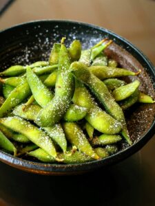 Learn how to cook Costco edamame with 4 easy methods: boiling, steaming, sautéing, and microwaving. Perfect for a healthy, protein-packed snack! Find tips on seasoning and cooking time.