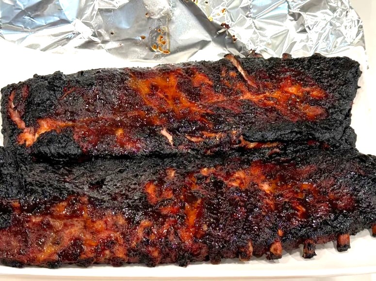 Learn how to cook Costco St. Louis-style pork ribs using the 3-2-1 method for tender, juicy results. This foolproof smoking technique will give you flavorful, fall-off-the-bone ribs with minimal effort.