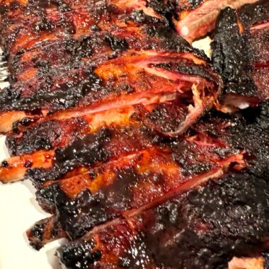Learn how to cook Costco St. Louis-style pork ribs using the 3-2-1 method for tender, juicy results. This foolproof smoking technique will give you flavorful, fall-off-the-bone ribs with minimal effort.