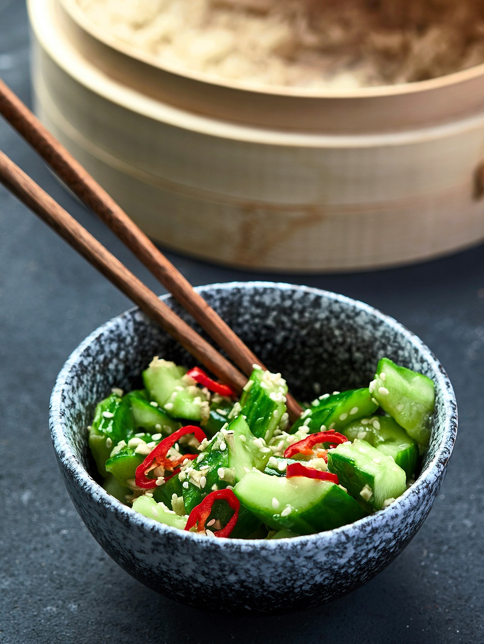 Make the famous crisp, spicy, and tangy Din Tai Fung cucumber salad at home with this easy copycat recipe. Made with Persian cucumbers, garlic, sesame oil, and chili oil—it's perfect as a refreshing side dish or appetizer!