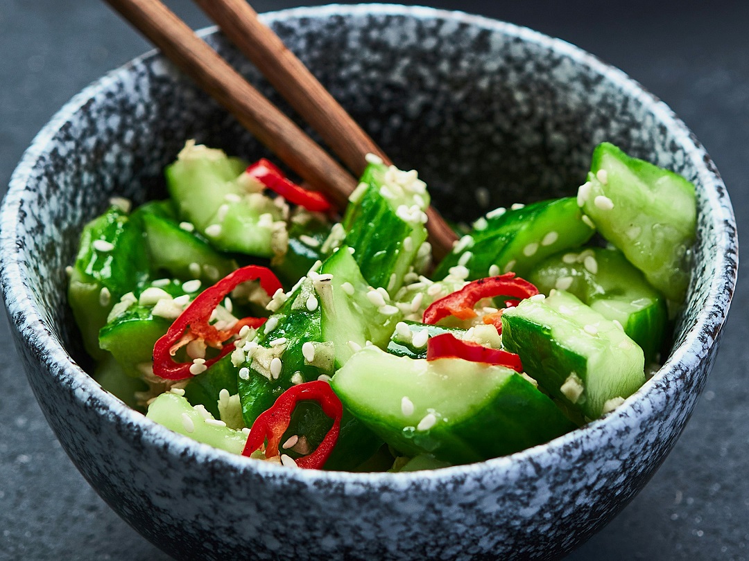 Make the famous crisp, spicy, and tangy Din Tai Fung cucumber salad at home with this easy copycat recipe. Made with Persian cucumbers, garlic, sesame oil, and chili oil—it's perfect as a refreshing side dish or appetizer!