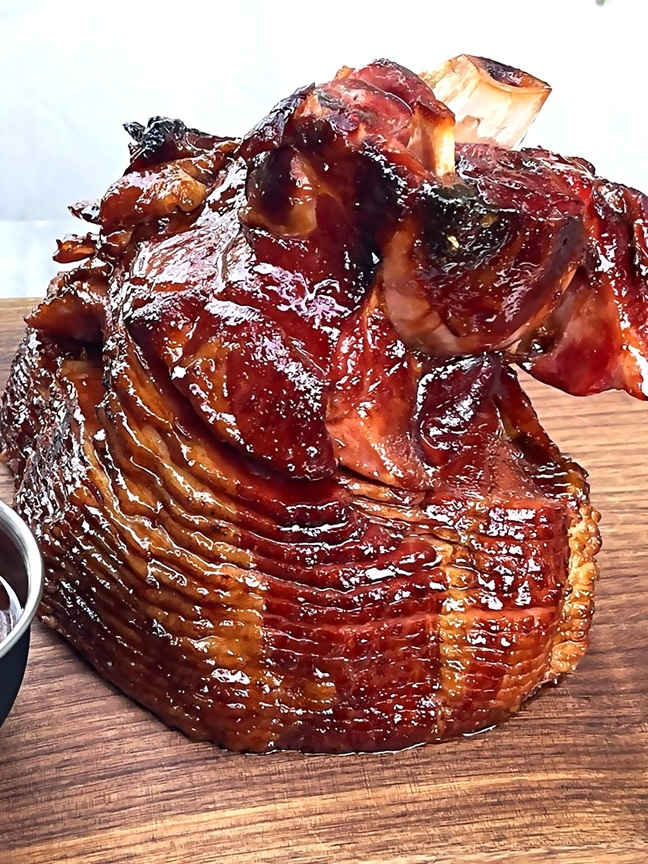 Learn how to cook a spiral sliced ham with a rich, homemade glaze — the perfect centerpiece for your next holiday meal or special occasion.